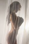 Arousing Lily Xo Loves Teasing With Her Naked Hot Body Behind The Curtain