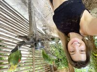 Melena Maria Rya with parrots