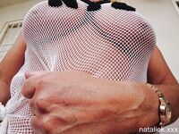 Spreading and fingering naked in string vest