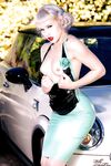 The Sexy Blonde In Latex Outfit Mosh Is Posing Half Naked Near The Luxurious Cabriolet