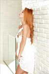 Slim Tanned Ginger Babe In White Dress Roberta Berti Strips For The Camera