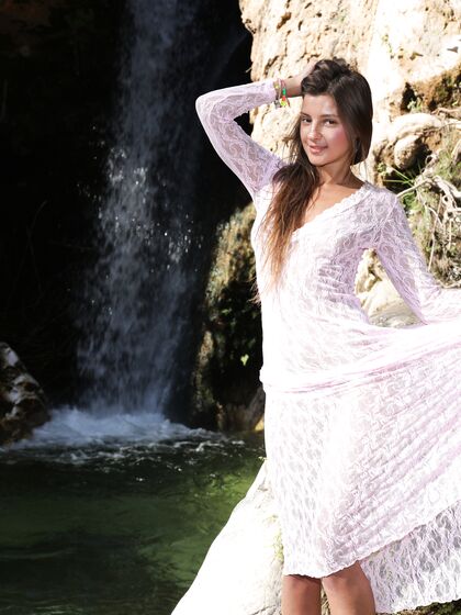Melena Maria Rya at the Waterfall