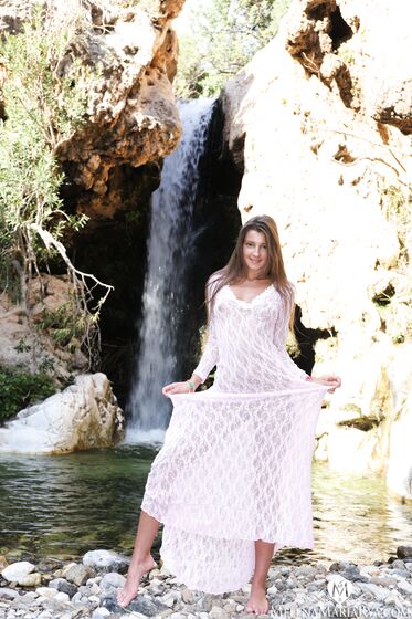 Melena Maria Rya at the Waterfall