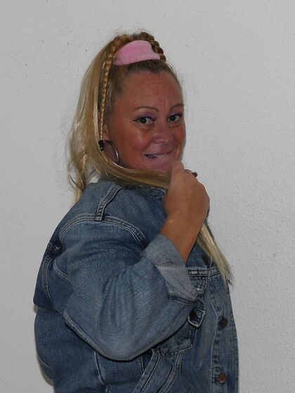 posing in denim jacket