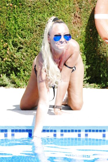 Flashing ass and tits in FC swag swimwear by the public pool