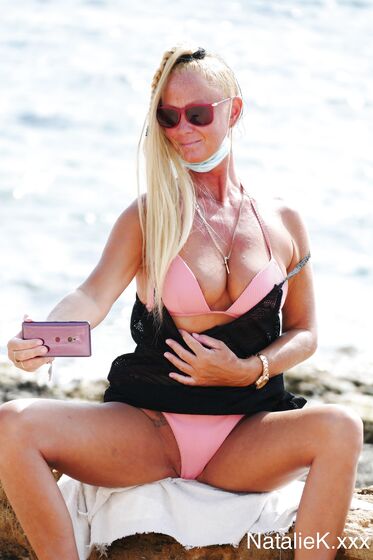 BTS selfies on the rocky beach front