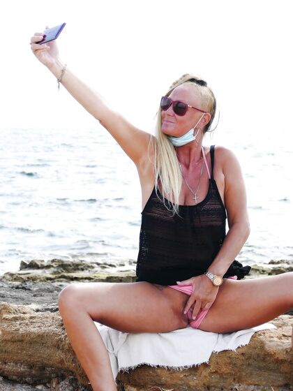 BTS selfies on the rocky beach front