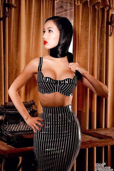 Elegant Oriental Babe Jade Vixen With Big Tits And Long Legs Strips Put Of Her Narrow Latex Costume
