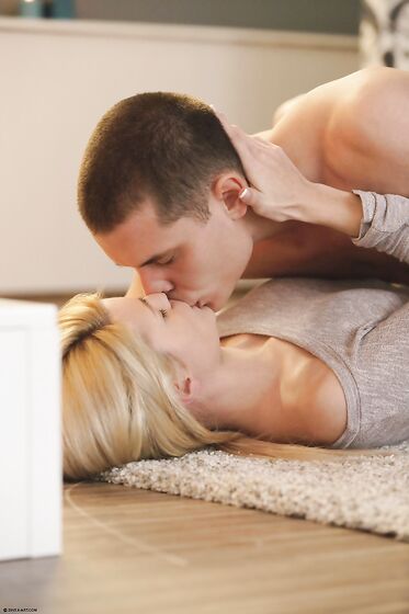 Jenny Anne Is Lying On The Floor And Her Boyfriend Is Kissing Her Sweet Lips Before Fucking Them