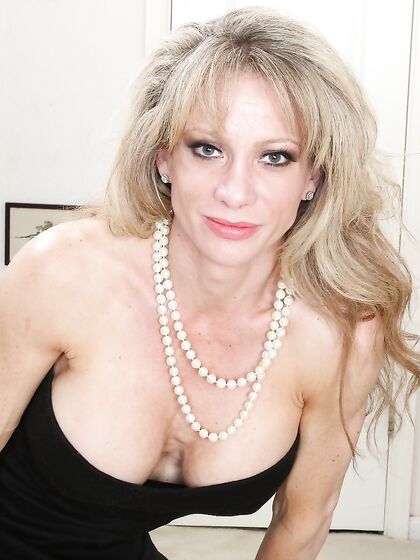 Sexually Excited Milf Raquel Sultra Is Slowly Stripping And Masturbating The Nub