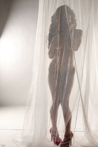 Arousing Lily Xo Loves Teasing With Her Naked Hot Body Behind The Curtain