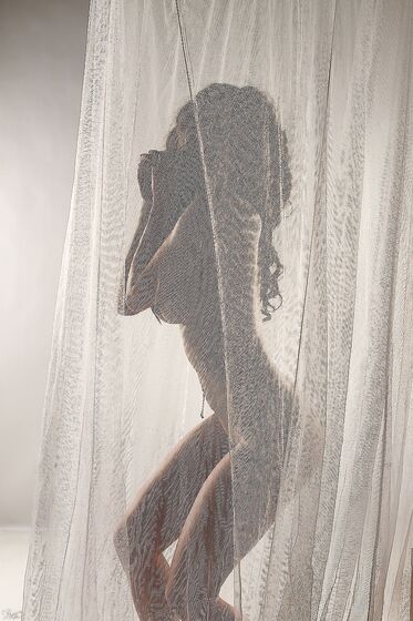 Arousing Lily Xo Loves Teasing With Her Naked Hot Body Behind The Curtain