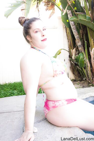 Bikini Striptease By The Pool - Zip