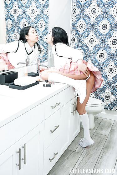 Adorable Asian Schoolgirl Elle Lee Sits Her Shaved Pussy Down On A Hard Dick