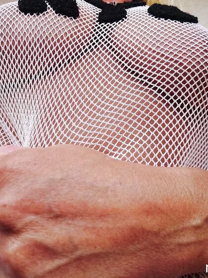 Spreading and fingering naked in string vest