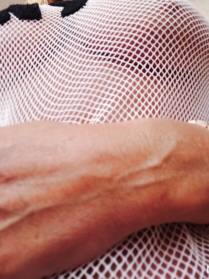 Spreading and fingering naked in string vest