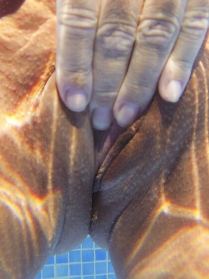Underwater public nudity and finger fucking
