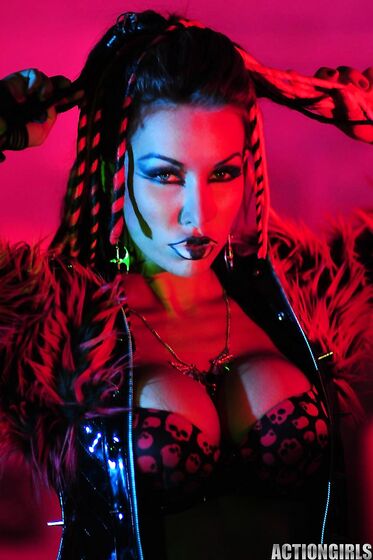 Big Racked Fetish Lady Kobe Kaige With Crazy Make-up Does Some Modeling In The Dark