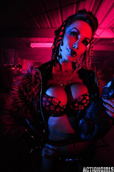 Big Racked Fetish Lady Kobe Kaige With Crazy Make-up Does Some Modeling In The Dark