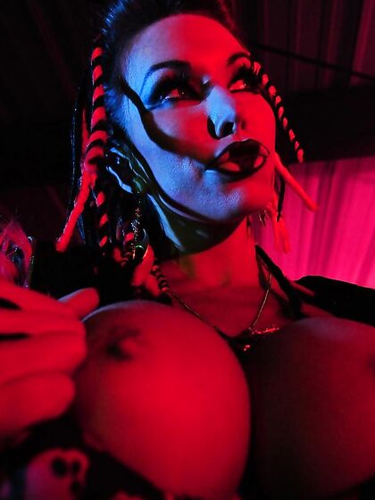 Big Racked Fetish Lady Kobe Kaige With Crazy Make-up Does Some Modeling In The Dark