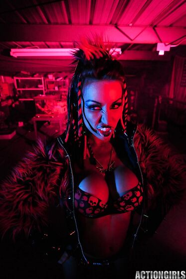 Big Racked Fetish Lady Kobe Kaige With Crazy Make-up Does Some Modeling In The Dark