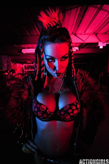 Big Racked Fetish Lady Kobe Kaige With Crazy Make-up Does Some Modeling In The Dark
