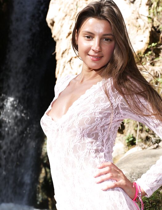 Melena Maria Rya at the Waterfall
