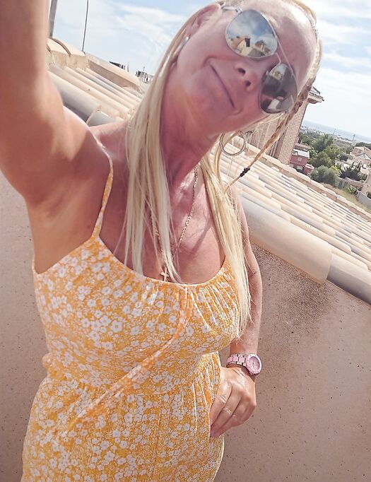 tits out and fingering outside in orange floral playsuit