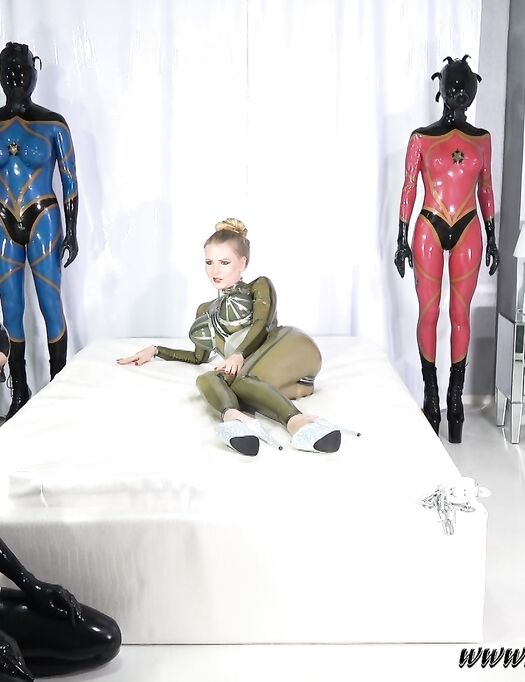 The Rubberqueen Estelle and her 2 Rubberdrones use their Latexslave Part1