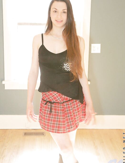 Shedding Her School Girl Uniform Petra Nubiles Exhibits Her Lean And Tight Body With Long Hair
