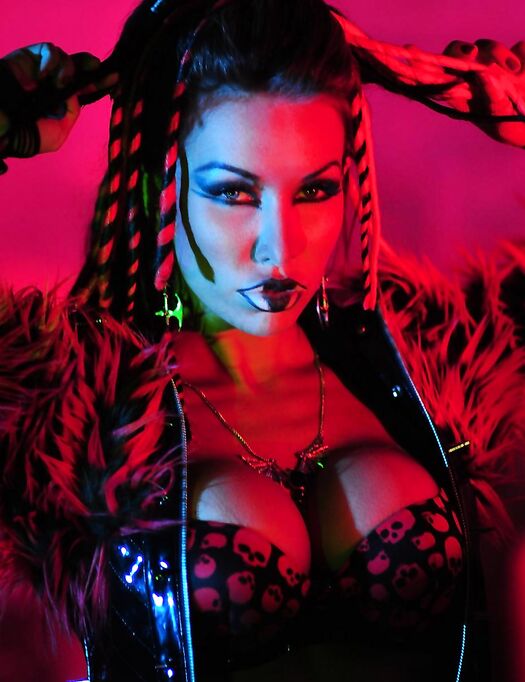 Big Racked Fetish Lady Kobe Kaige With Crazy Make-up Does Some Modeling In The Dark